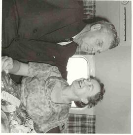 John and Olive Diefenbaker posing on plane