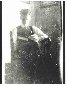 Young John Diefenbaker reading