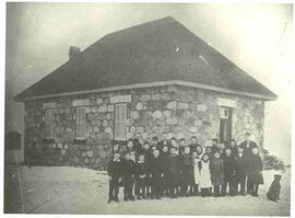 Class photo near the Little Stone School House (Victoria School)