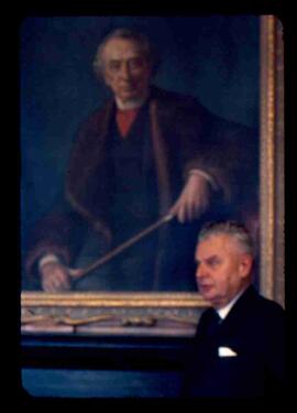 John Diefenbaker next to Sir John A MacDonald portrait