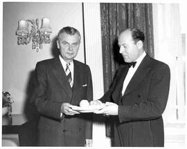 John Diefenbaker with a waiter