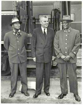 John Diefenbaker standing with railway workers