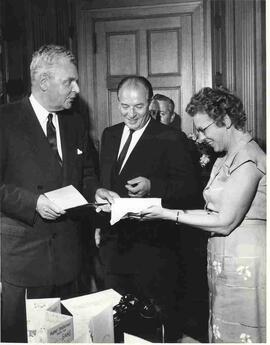 John Diefenbaker with J. Fisher and Miss Pound at office birthday party