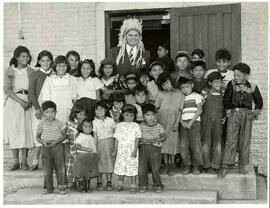John Diefenbaker in Indigenous head dress at St. Michael's Residential School in Duck Lake