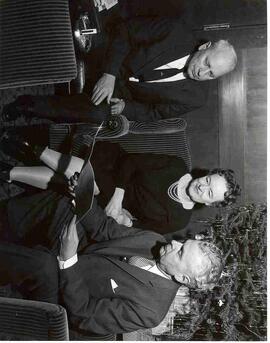 Elmer, Olive and John Diefenbaker beside Christmas tree