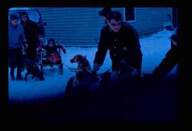 Weir family with dog sled team