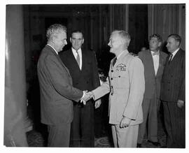 John Diefenbaker speaking to a military man