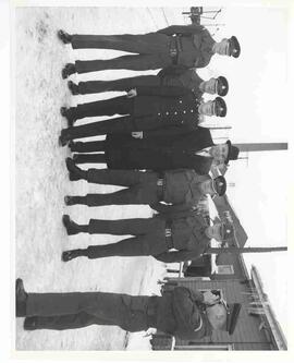 John Diefenbaker posing with soldiers in Prince Edward Island