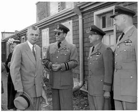 John Diefenbaker with RCAF officers at an airport