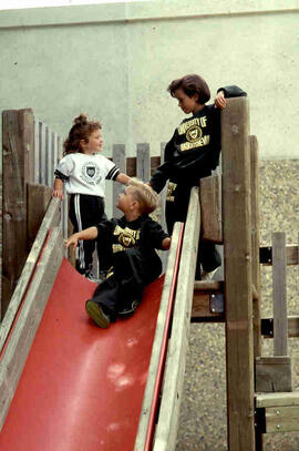 Children in University of Saskatchewan apparel
