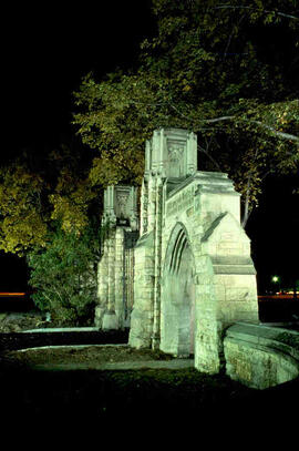 Memorial gates at night