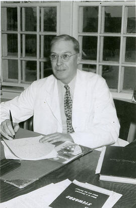 Dr. Wilf Rae - At Desk
