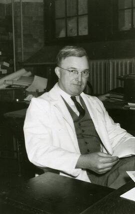 Dr. Donald S. Rawson - At Desk