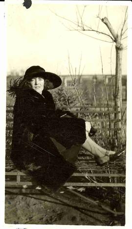 Edna Diefenbaker posing on a park bench
