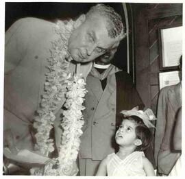 John Diefenbaker with a little girl in India