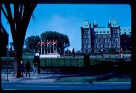 Flags on front lawn; Parliament Buildings