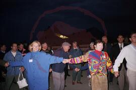 Visitors participating in round dance