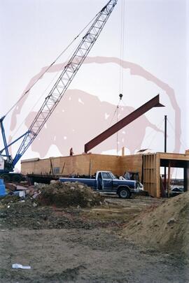 Crane moving steel beam