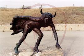 Bison calf runner sculpture