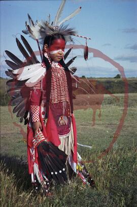 Stacy Spencer posing in traditional regalia