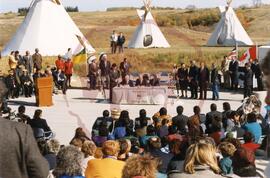 Distant view of the Hon. Tom Siddon and Treaty Commissioner Cliff Wright signing agreement