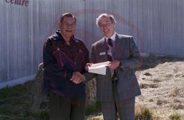 Ted Hanlon from Wascana presenting cheque to Senator Ernest Mike