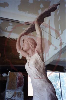 Left-side view of clay model of the woman
