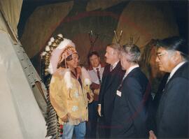 Prime Minister Brian Mulroney in museum with Chief Hank Neapetung, Jeremy Morgan and Cyrus Standing