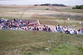 Audience watching dancers performing in amphitheatre