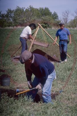 Field staff at work on sifting screens