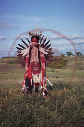 Stacy Spencer posing in traditional regalia