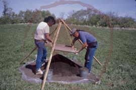 Field staff at work on sifting screens